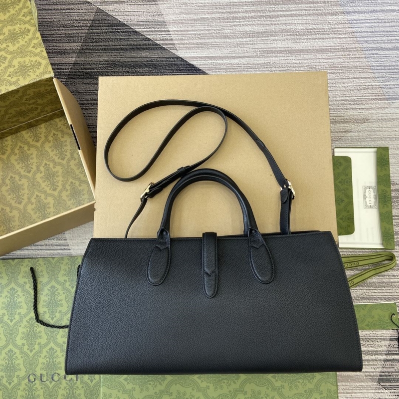 G*u*i top handle bags